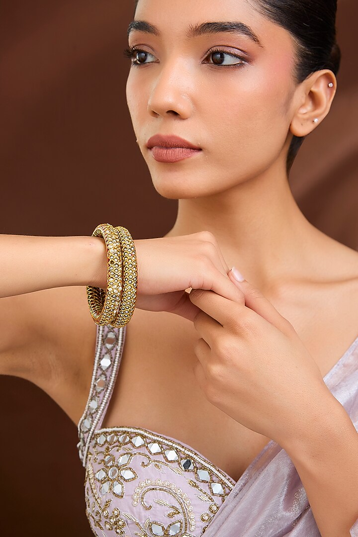 Gold Plated Pearl Bangles (Set Of 2) by Just Shraddha at Pernia's Pop Up Shop