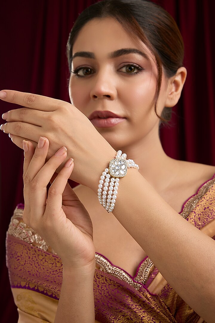 Gold Plated Kundan Polki & Faux Pearl Bracelet by Just Shraddha at Pernia's Pop Up Shop