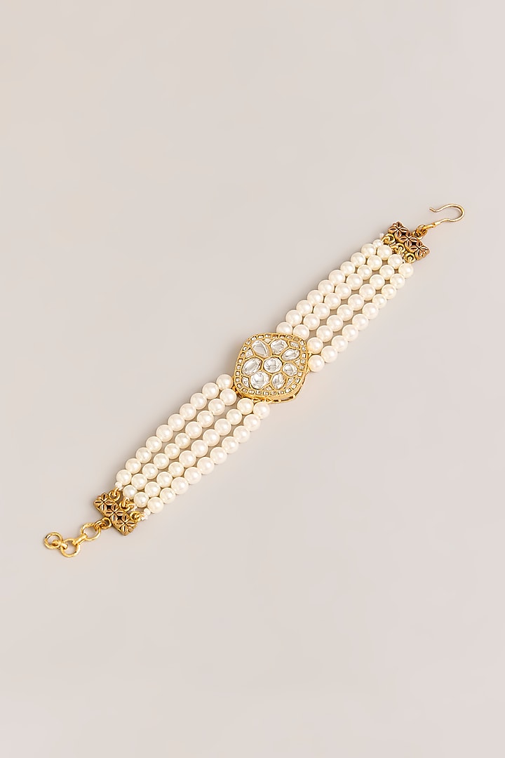Gold Plated Kundan Polki & Faux Pearl Bracelet by Just Shraddha at Pernia's Pop Up Shop