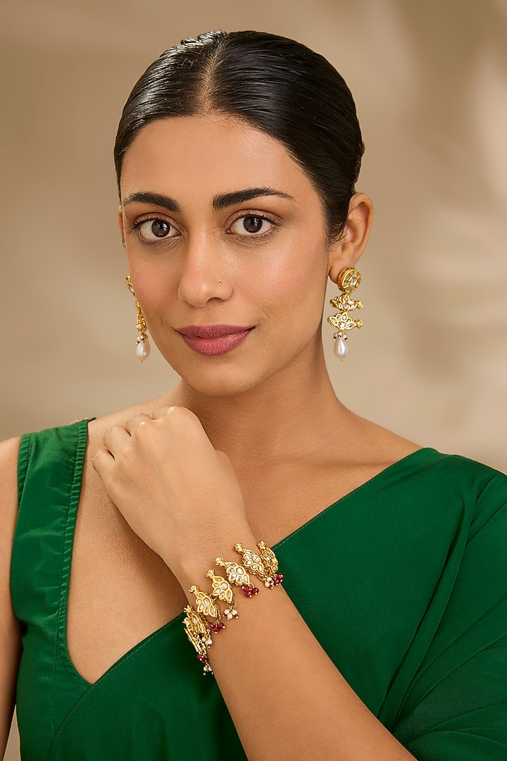 Gold Finish Pearl & Beaded Floral Bracelet by Just Shraddha at Pernia's Pop Up Shop