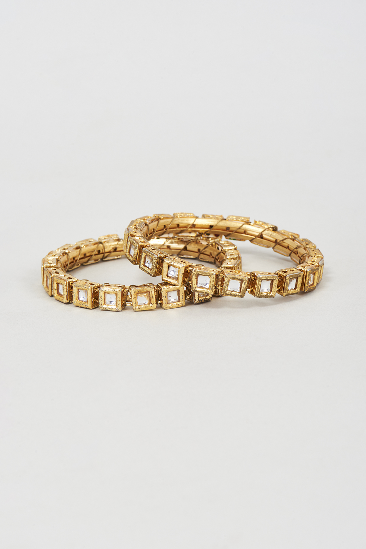 Gold Plated Kundan Polki Bangles (Set Of 2) by Just Shraddha at Pernia's Pop Up Shop