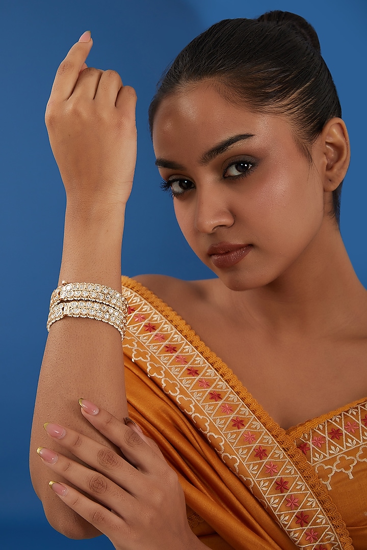 Gold Plated Kundan Polki & Pearl Bangles (Set of 2) by Just Shraddha at Pernia's Pop Up Shop