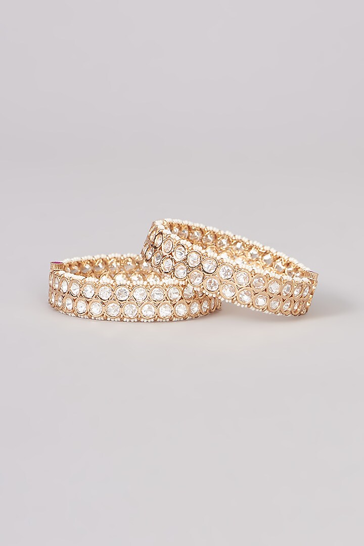 Gold Plated Kundan Polki & Pearl Bangles (Set of 2) by Just Shraddha at Pernia's Pop Up Shop