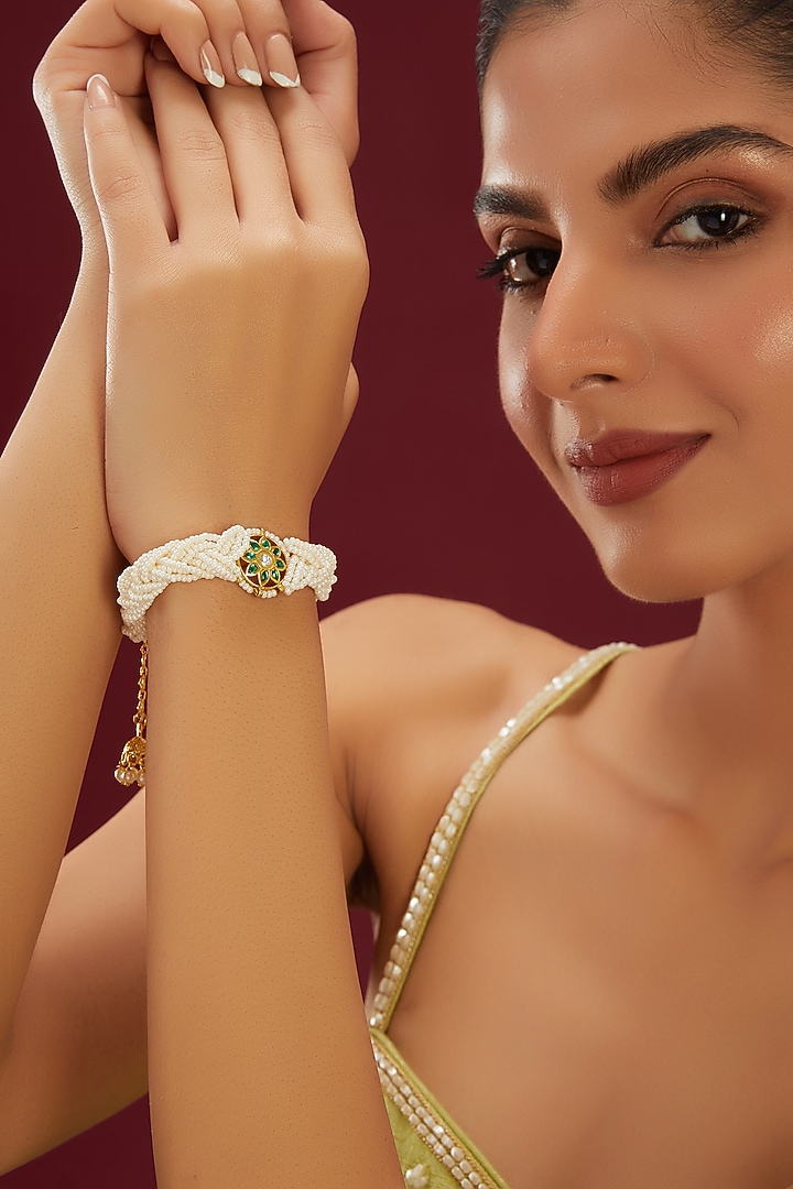 Dull Gold Finish Pleated Pearl Bracelet by Just Shraddha at Pernia's Pop Up Shop