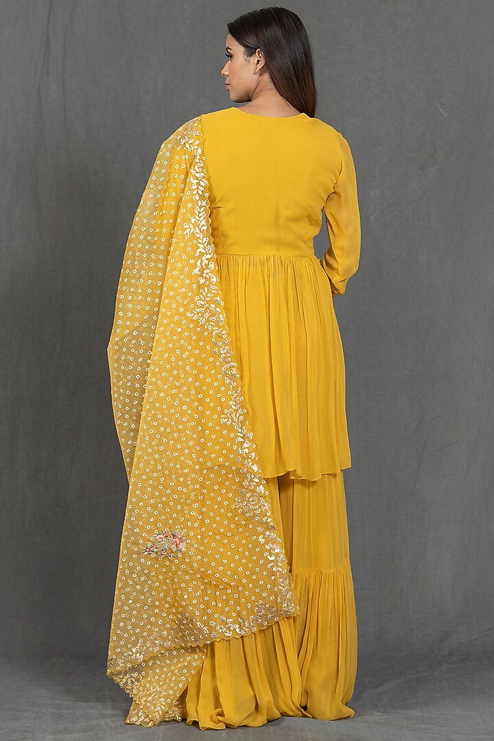 Yellow Leather Applique Kurta Set by Kimaya by Vandana Rathi at Pernia's Pop Up Shop