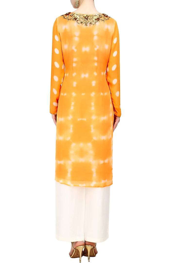 Krishna Mehta presents Orange floral zardozi and beads embroidered tye and dye tunic and off white pants set available only at Pernia's Pop Up Shop.