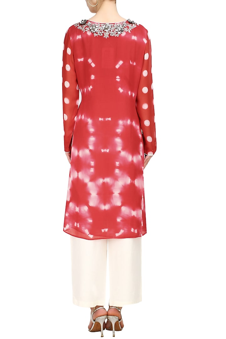 Krishna Mehta presents Red 3D floral motifs tye and dye tunic and off white pants set available only at Pernia's Pop Up Shop.