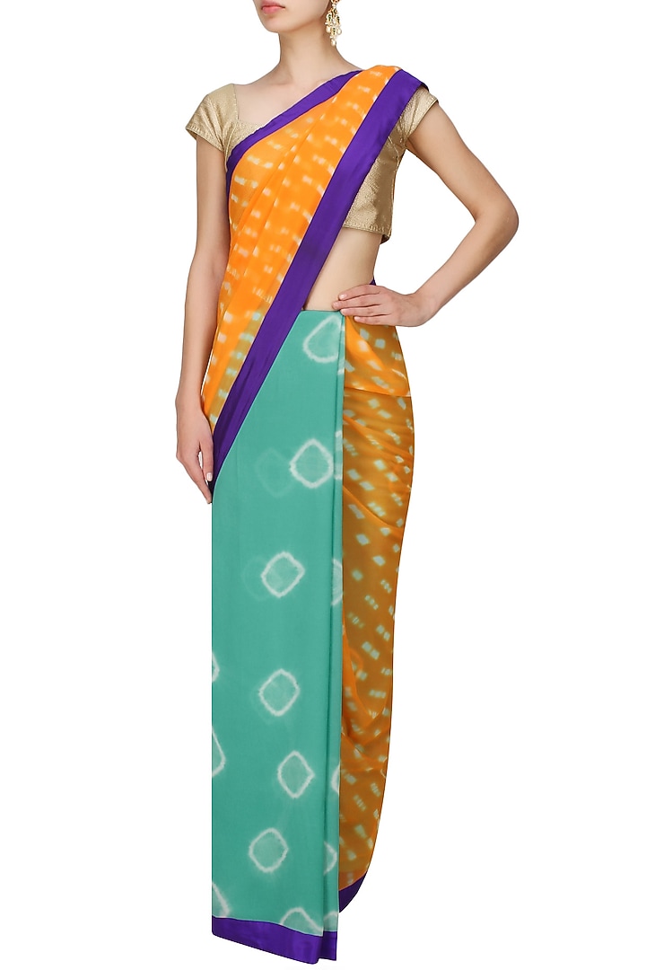 Krishna Mehta presents Orange and blue tye and dye printed saree available only at Pernia's Pop Up Shop.