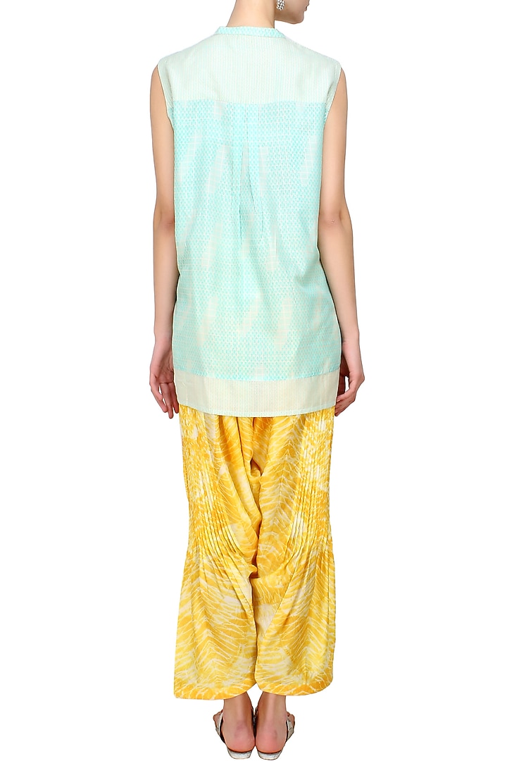Ivory and green textured short tunic and yellow printed pants set available only at Pernia's Pop Up Shop.