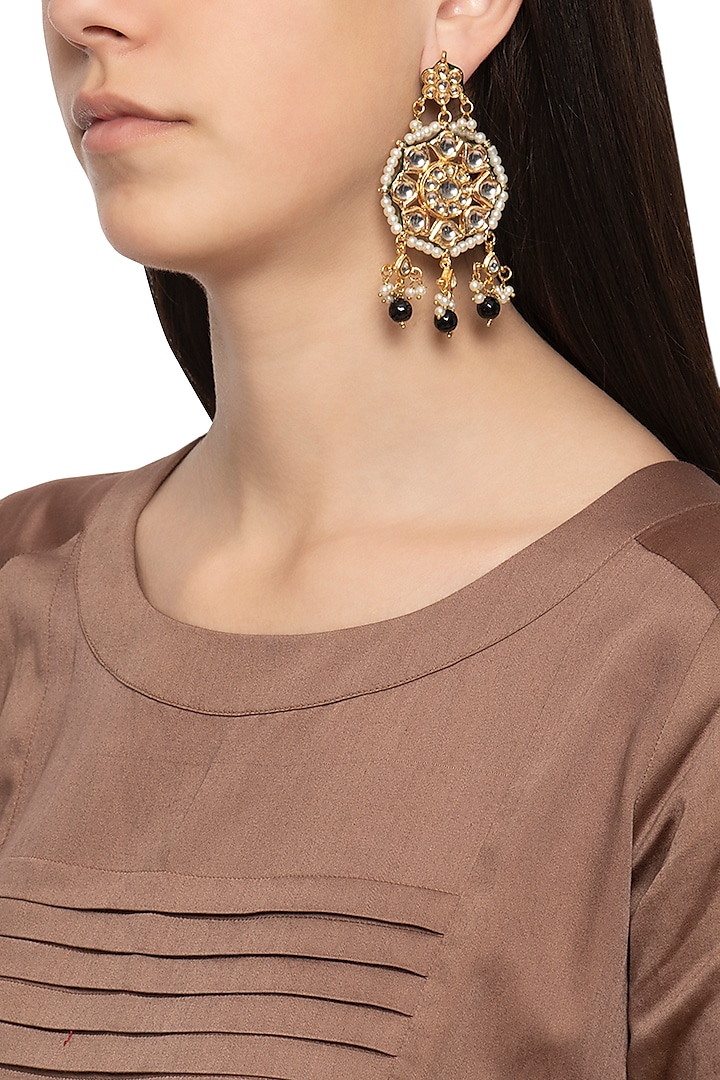 Gold plated round kundan earrings by Just Shraddha