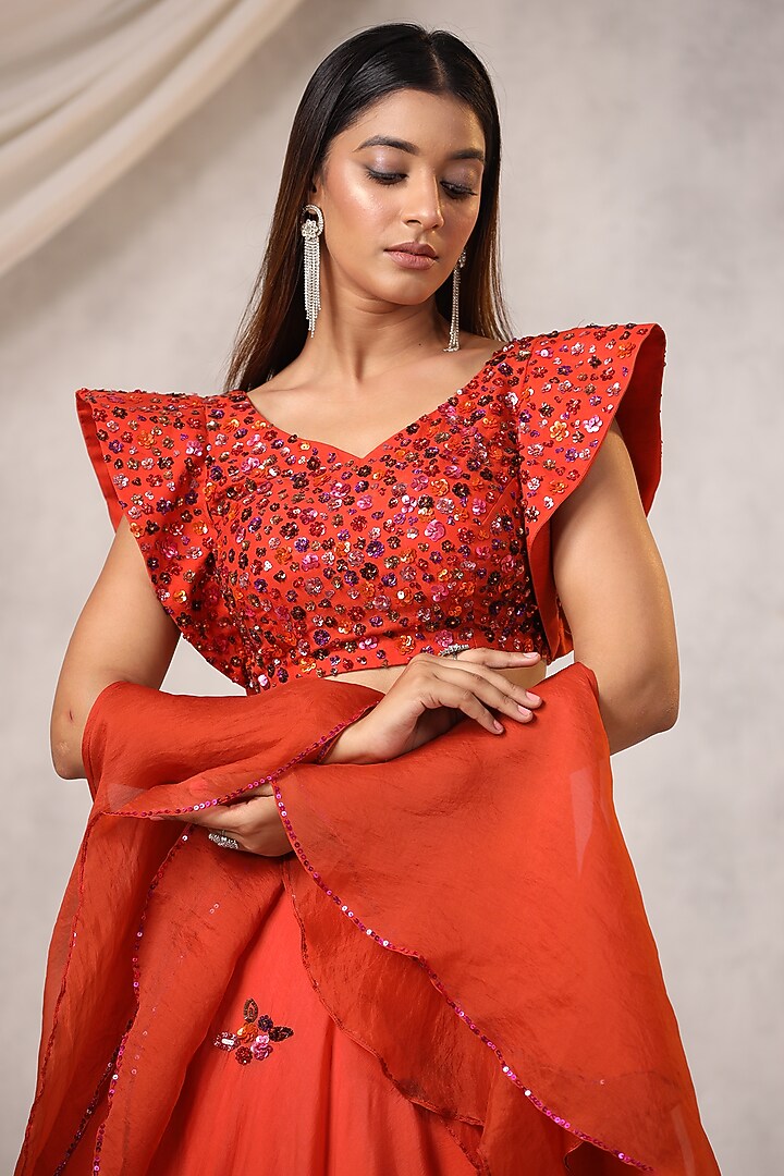 Burnt Orange Organza Sequins Embroidered Wedding Lehenga Set by K-ANSHIKA Jaipur at Pernia's Pop Up Shop