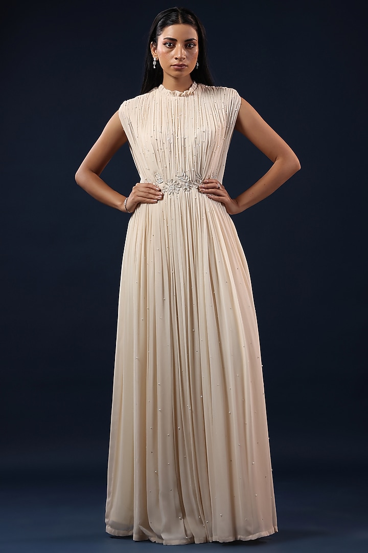 Off-White Georgette Sequin Embellished Pleated Party Wear Gown by K-ANSHIKA Jaipur at Pernia's Pop Up Shop