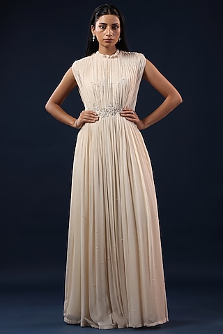 Off-White Georgette Sequin Embellished Pleated Gown by K-ANSHIKA Jaipur
