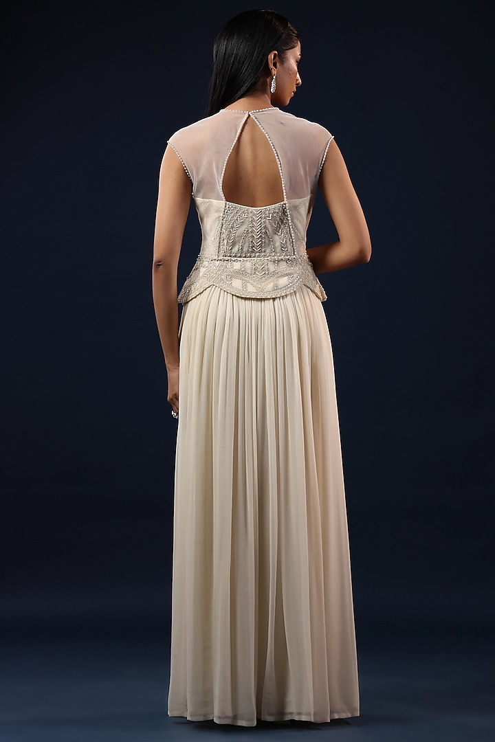 Off-White Georgette Pearl Embellished Peplum Engagement Gown by K-ANSHIKA Jaipur at Pernia's Pop Up Shop