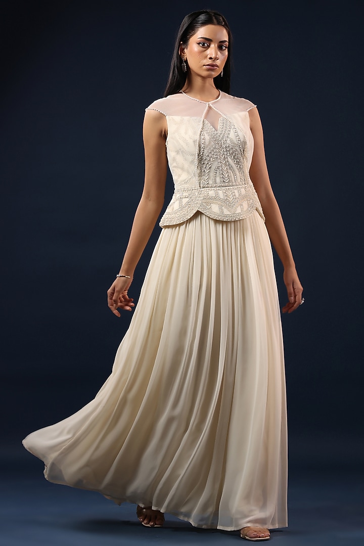 Off-White Georgette Pearl Embellished Peplum Engagement Gown by K-ANSHIKA Jaipur at Pernia's Pop Up Shop