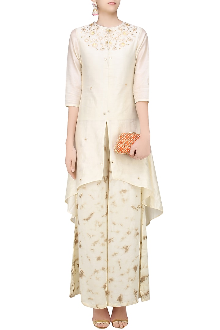 Off white gota patti high low kurta with tye and dye palazzo pants available only at Pernia's Pop Up Shop.