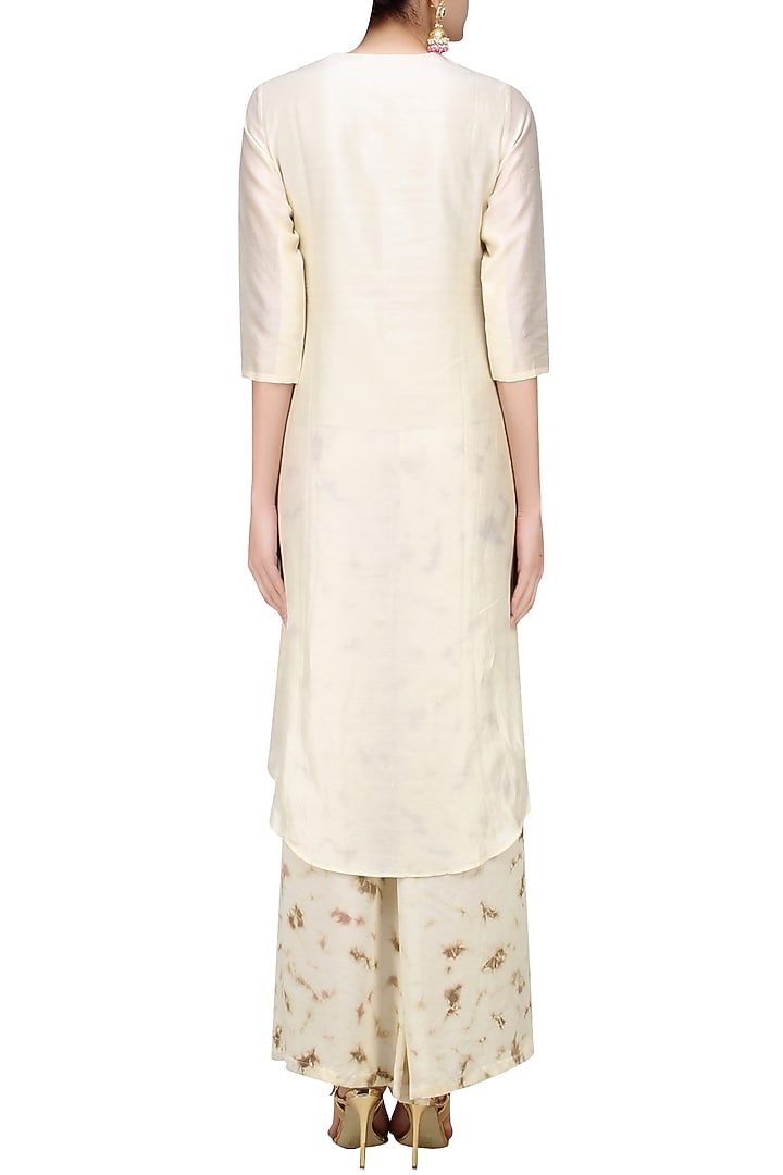 Off white gota patti high low kurta with tye and dye palazzo pants available only at Pernia's Pop Up Shop.
