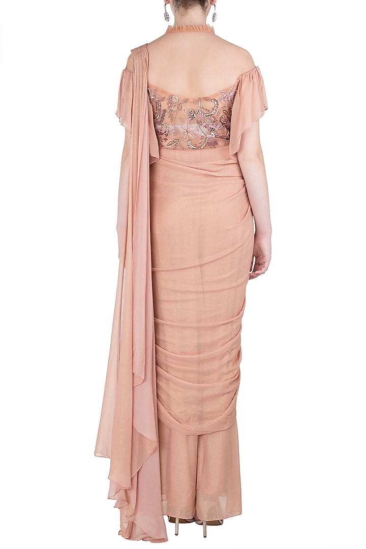 Peach asymmetrical embroidered saree gown available only at Pernia's Pop Up Shop.