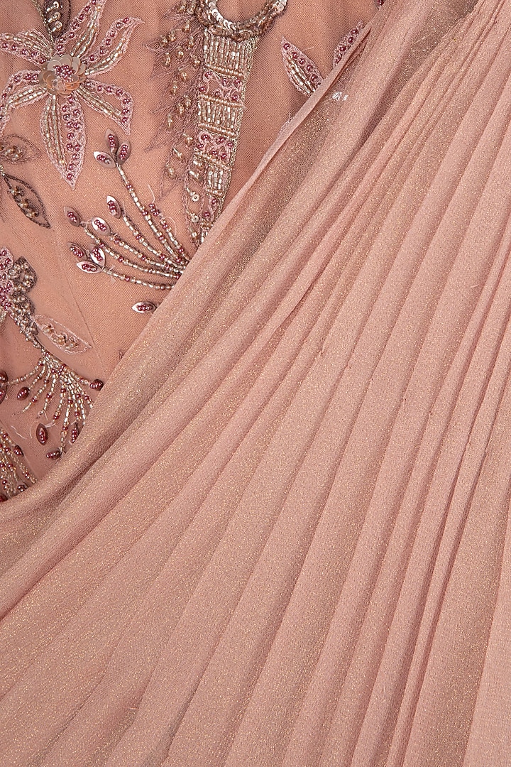 Peach asymmetrical embroidered saree gown available only at Pernia's Pop Up Shop.