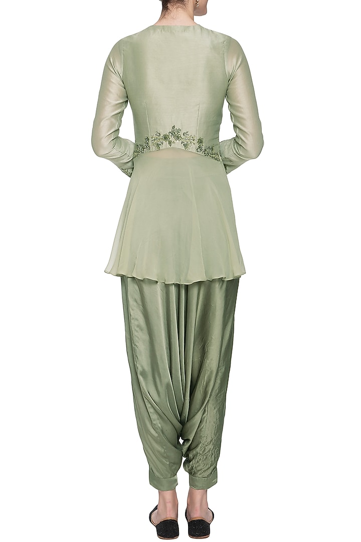 Pistachio embroidered peplum top with pants by K-ANSHIKA Jaipur at Pernia's Pop Up Shop