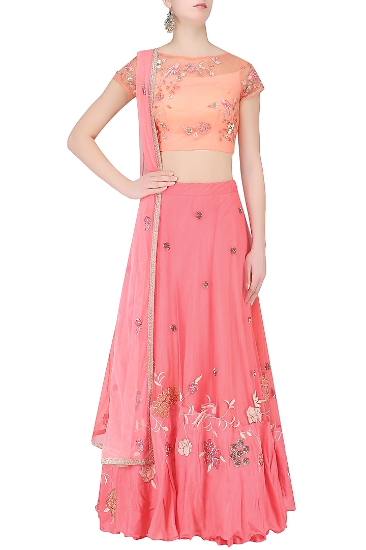 Peach floral embroidered crop top with rose pink skirt available only at Pernia's Pop Up Shop.