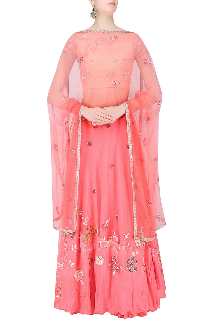 Peach floral embroidered crop top with rose pink skirt available only at Pernia's Pop Up Shop.