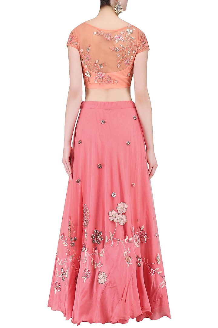 Peach floral embroidered crop top with rose pink skirt available only at Pernia's Pop Up Shop.