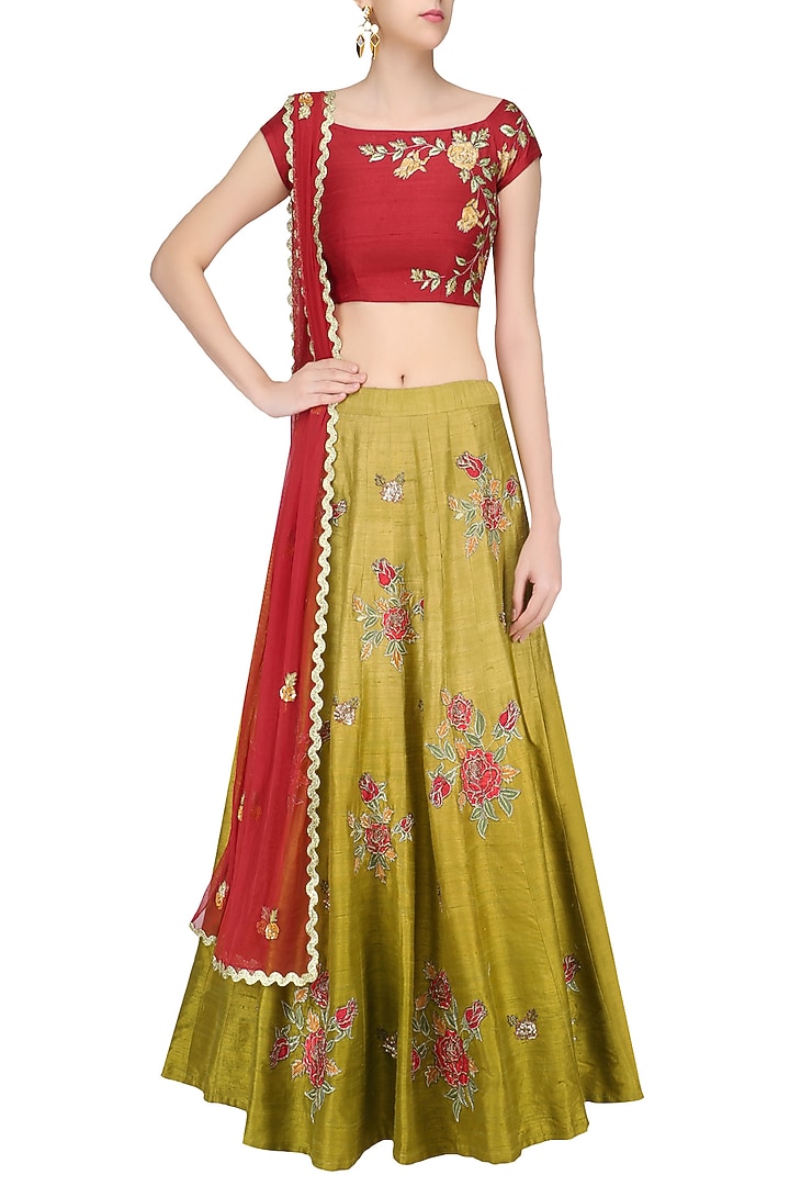 Red floral embroidered crop top with olive green skirt available only at Pernia's Pop Up Shop.