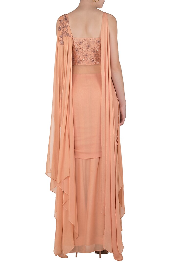 Dusty peach draped sari gown with matching peach blouse available only at Pernia's Pop Up Shop.