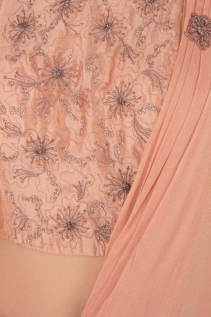 Dusty peach draped sari gown with matching peach blouse available only at Pernia's Pop Up Shop.
