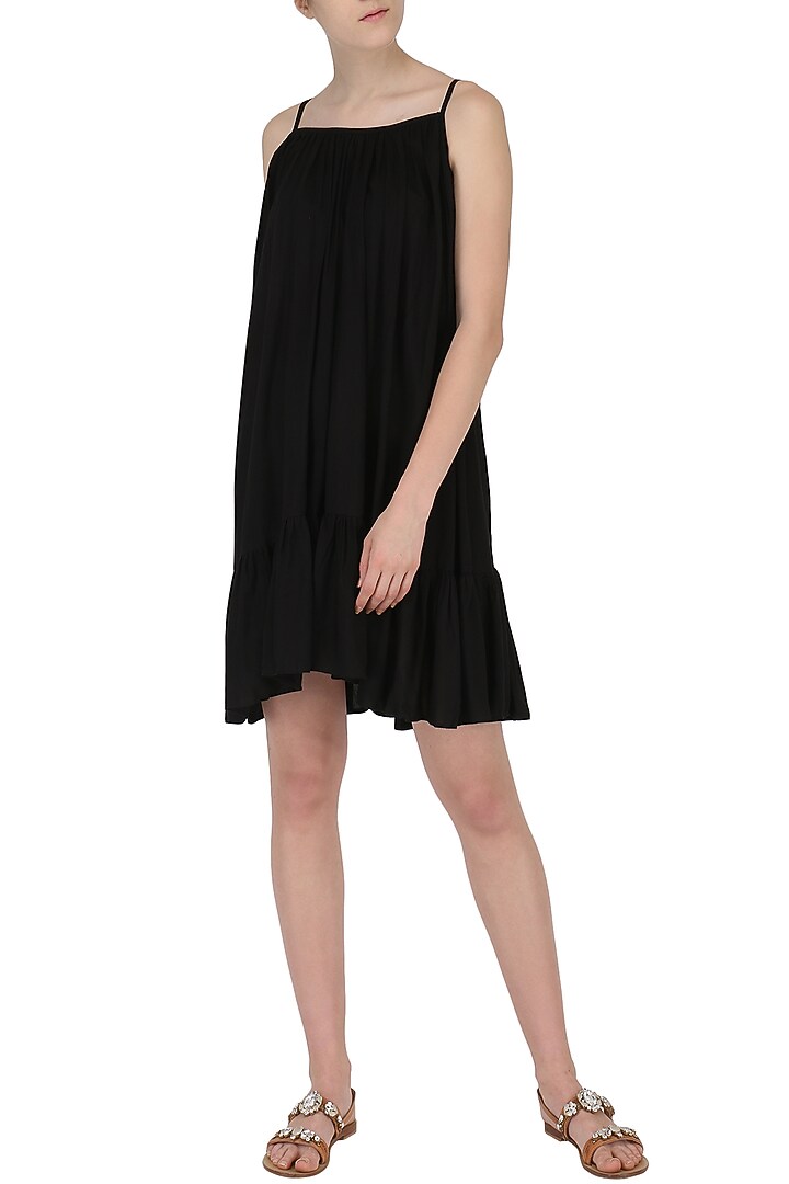 Black ruffled hem dress available only at Pernia's Pop Up Shop.