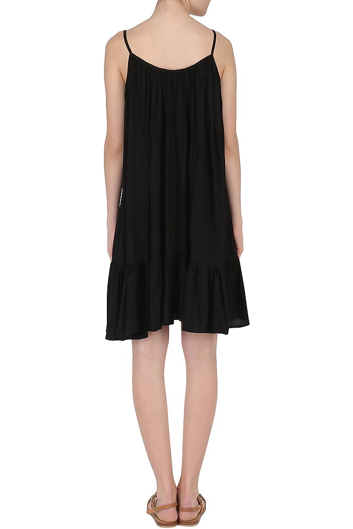 Black ruffled hem dress available only at Pernia's Pop Up Shop.