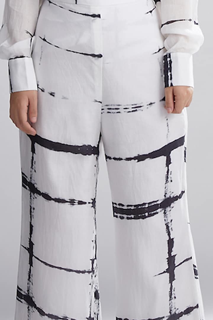 White & Black Printed Pants by Koai at Pernia's Pop Up Shop