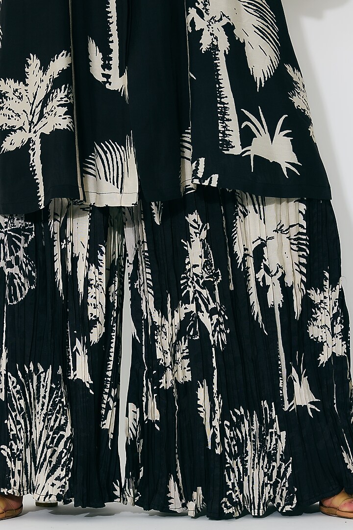 Black & Beige Muslin Cotton Silk Floral Printed Crinkled Pants by Koai at Pernia's Pop Up Shop
