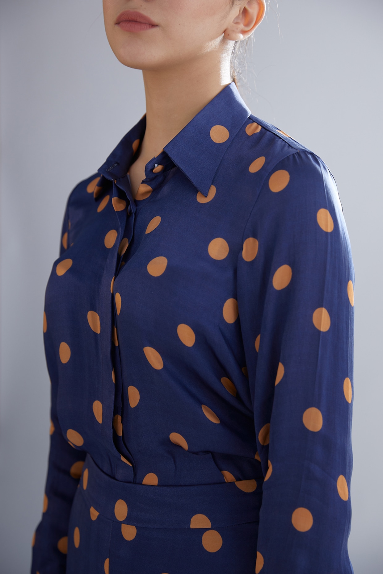 orange polka dot shirt