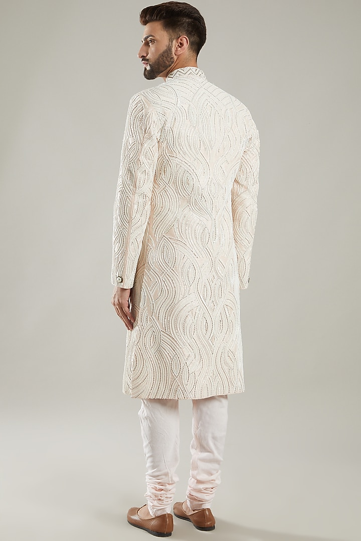 Ice Pink Silk Sequins Hand Embroidered Groom Sherwani Set by KODEXRAUL at Pernia's Pop Up Shop