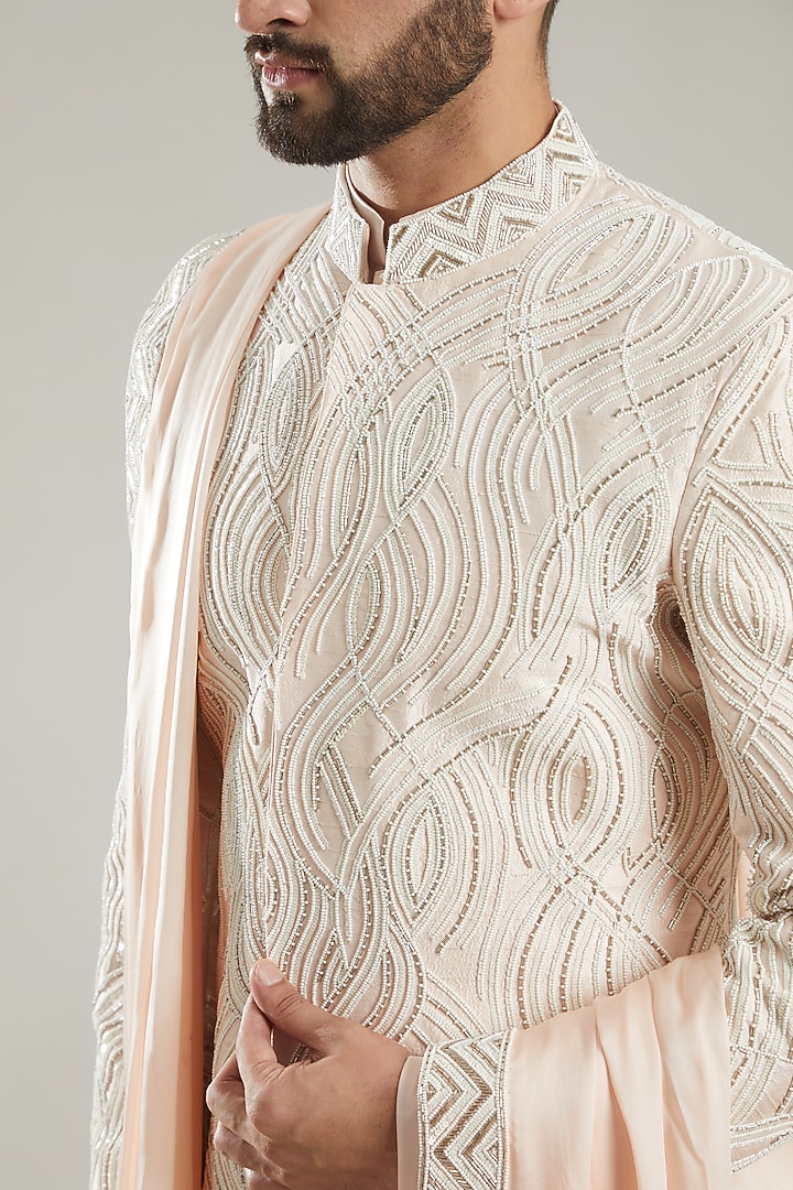 Ice Pink Silk Sequins Hand Embroidered Groom Sherwani Set by KODEXRAUL at Pernia's Pop Up Shop