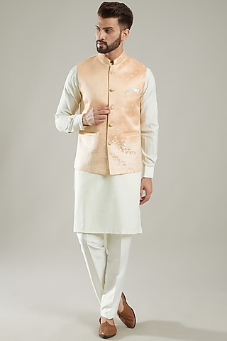 Peach Jacquard Bundi Jacket With Kurta Set by KODEXRAUL