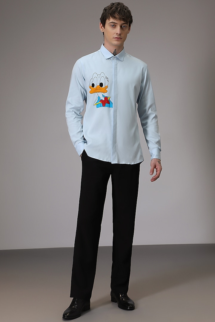 Powder Blue Cotton Satin Donald Duck Hand Embroidered Party Wear Shirt by Komal Kothari at Pernia's Pop Up Shop