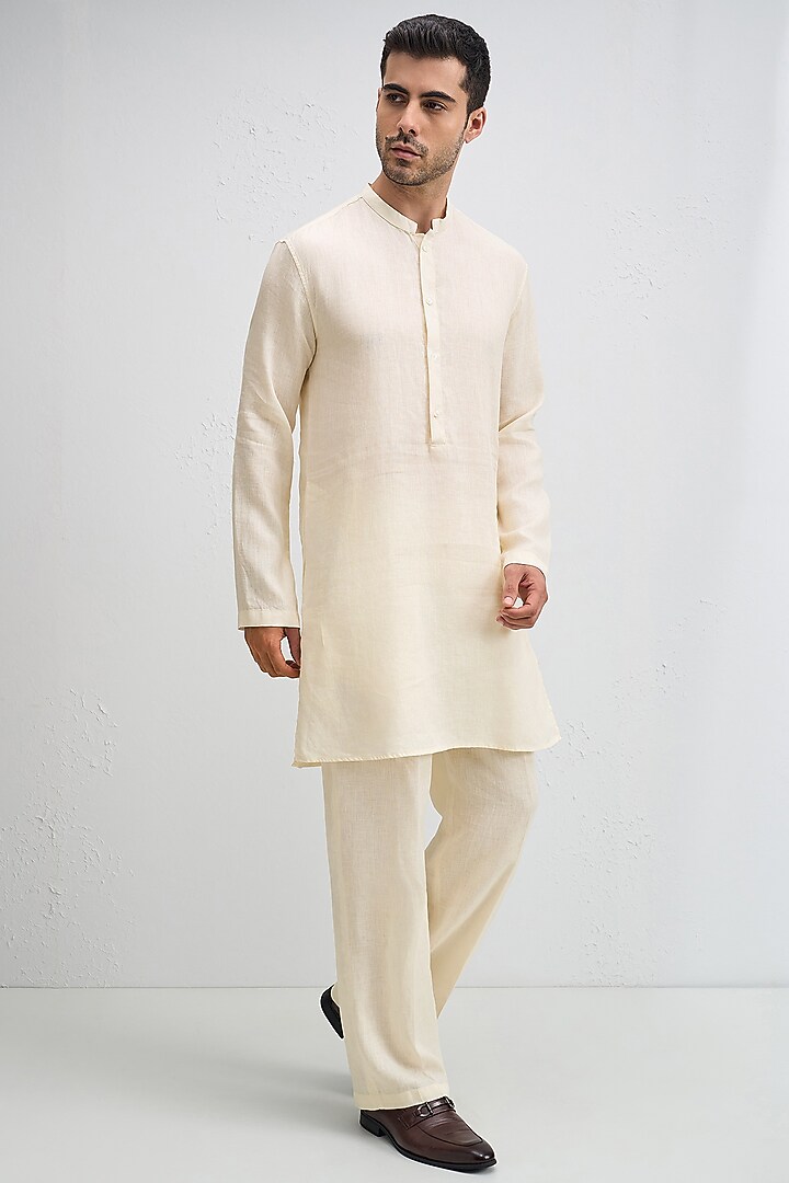 Ivory Linen Woven Kurta Set by Komal Kothari at Pernia's Pop Up Shop