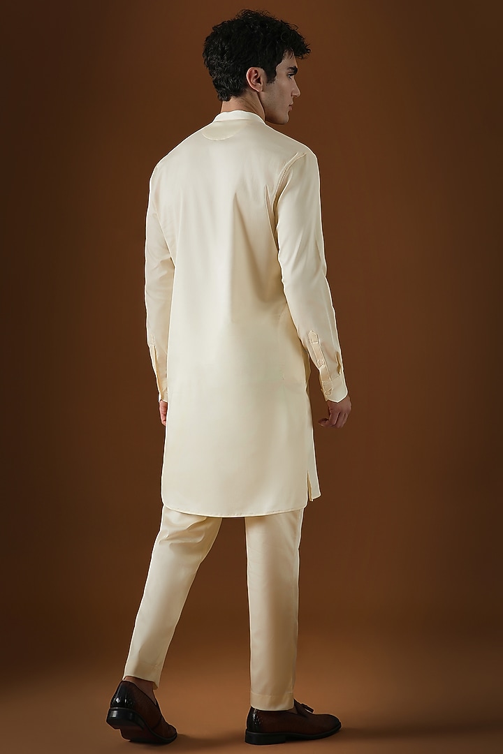 Ivory Cotton Floral Hand Embroidered Kurta by Komal Kothari at Pernia's Pop Up Shop
