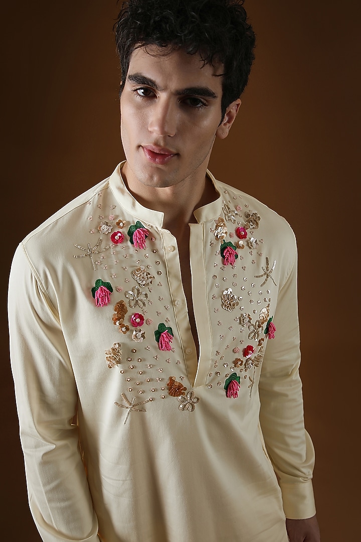 Ivory Cotton Floral Hand Embroidered Kurta by Komal Kothari at Pernia's Pop Up Shop