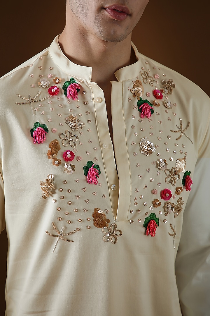 Ivory Cotton Floral Hand Embroidered Kurta by Komal Kothari at Pernia's Pop Up Shop