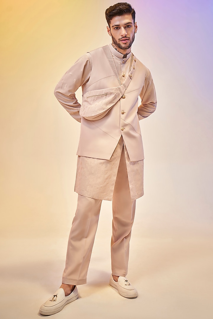 Pastel Peach Suiting Viscose Bundi Jacket With Kurta Set by KORA BY NILESH MITESH