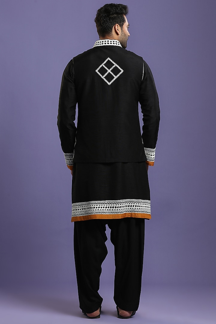Black Blended Cotton Embroidered Bundi Jacket Set by KORA BY NILESH MITESH at Pernia's Pop Up Shop