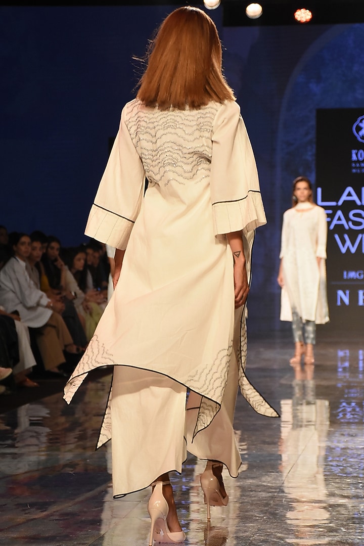 Ivory Asymmetric Embroidered Kurta With Overlapping Pants by House of Kotwara at Pernia's Pop Up Shop