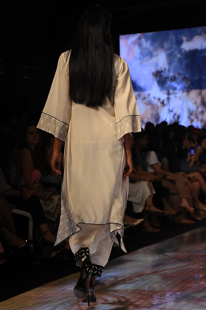 Ivory Asymmetric Kurta With Embroidered Pants by House of Kotwara at Pernia's Pop Up Shop