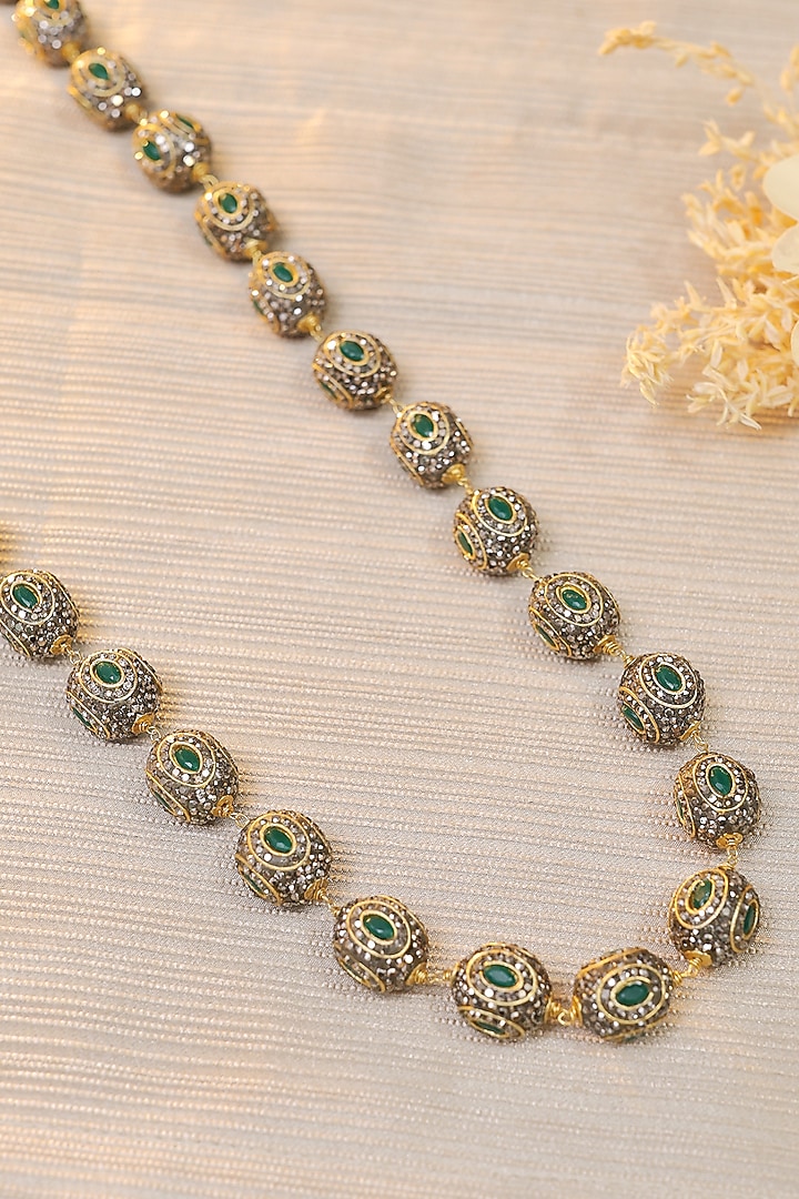 Gold Finish Emerald Stone Enameled Mala by KRAFTSMITHS at Pernia's Pop Up Shop