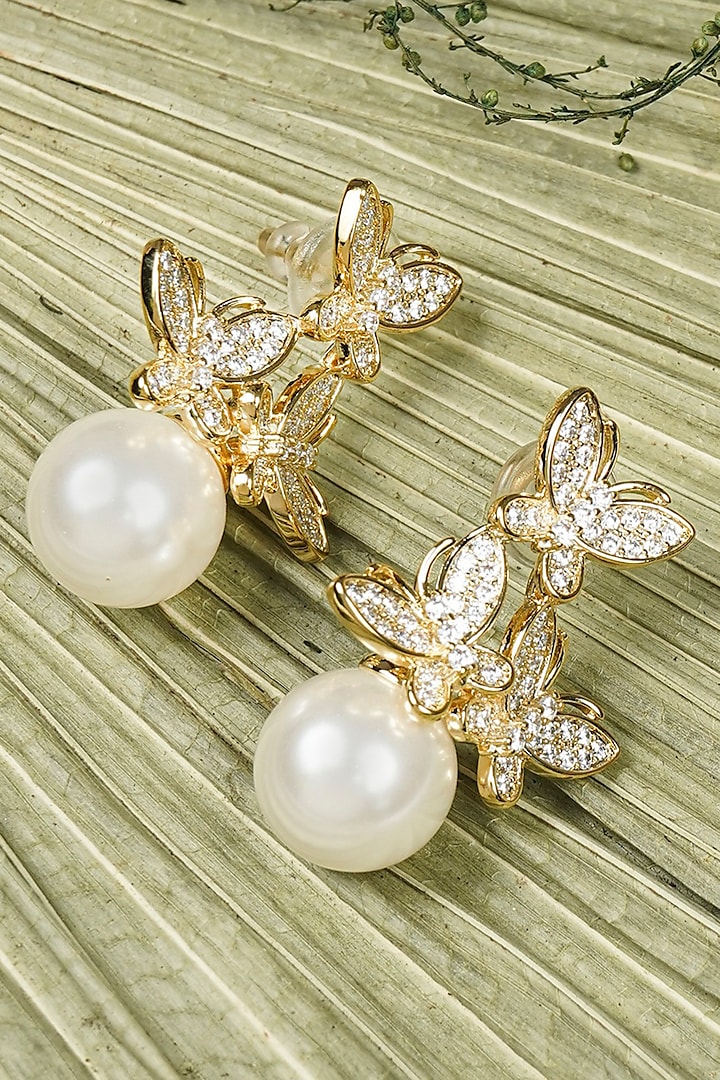 Gold Finish Pearl Butterfly Stud Earrings by KRAFTSMITHS at Pernia's Pop Up Shop