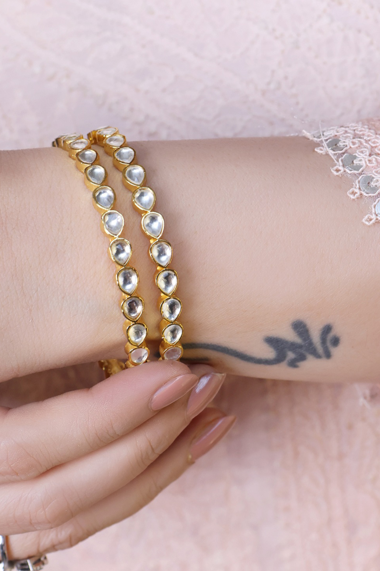 Gold Finish Kundan Polki Bangles (Set Of 2) by KRAFTSMITHS at Pernia's Pop Up Shop